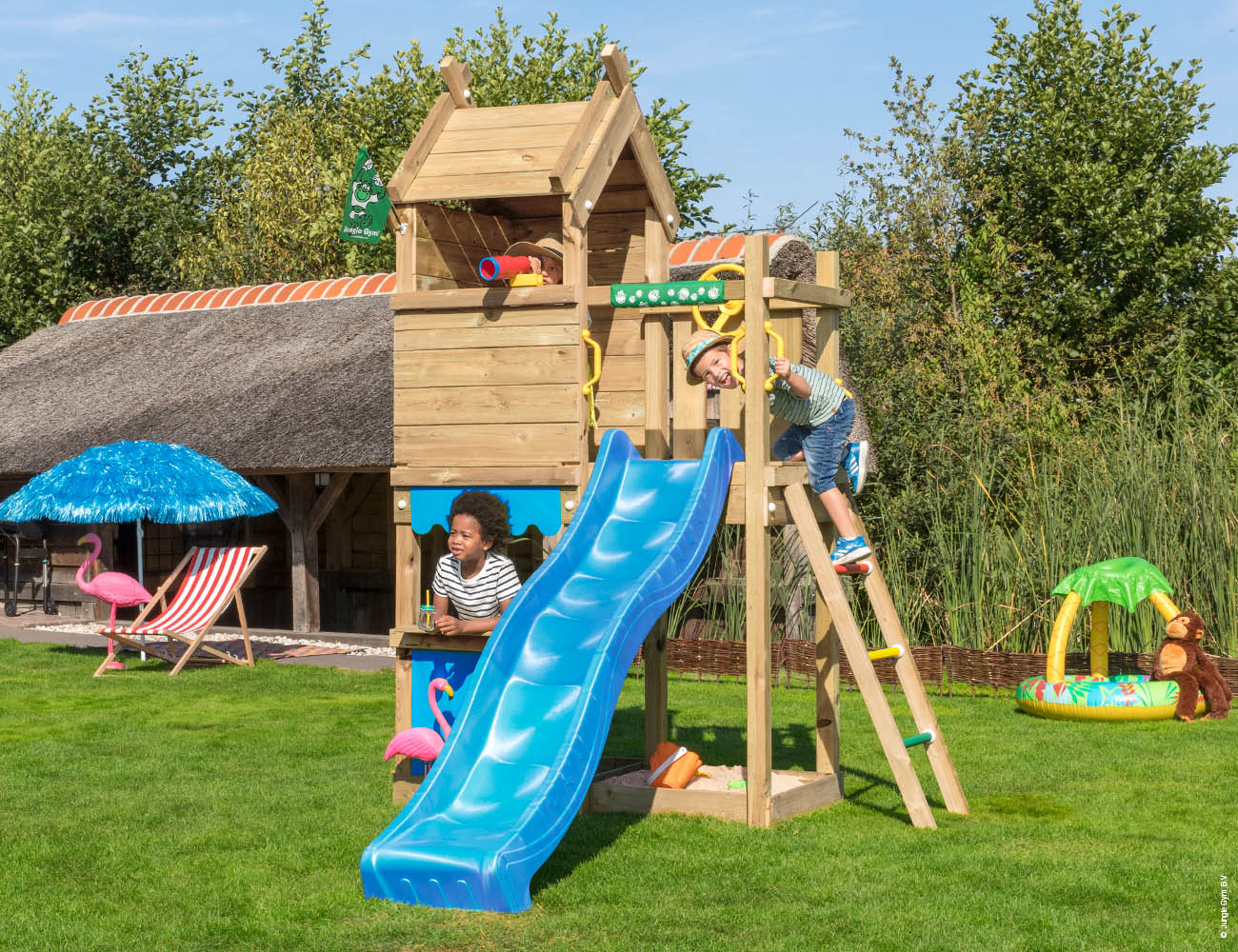 jungle-gym-jungle-resort-torre-gioco-in-legno-con-scivolo-e-bancarella-del-merca image 5